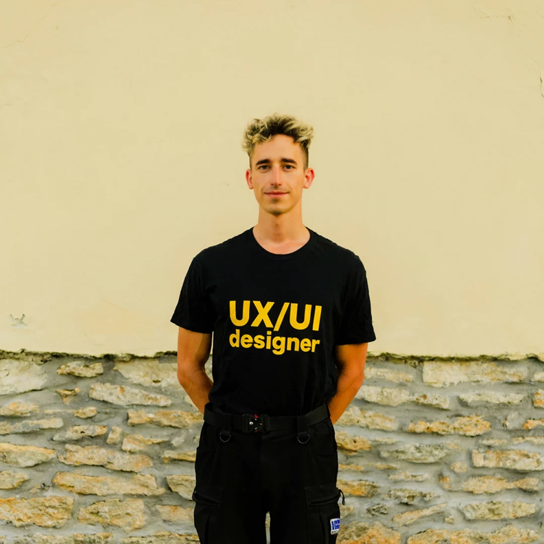 Andrii Kolodiazhenskyi in a “UX/UI designer” t-shirt