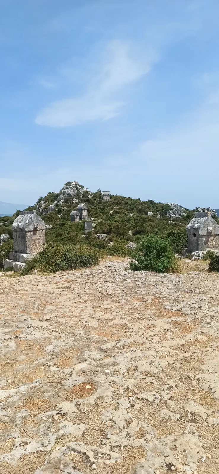 Lycian stone sarcophagi on a hill above the sea