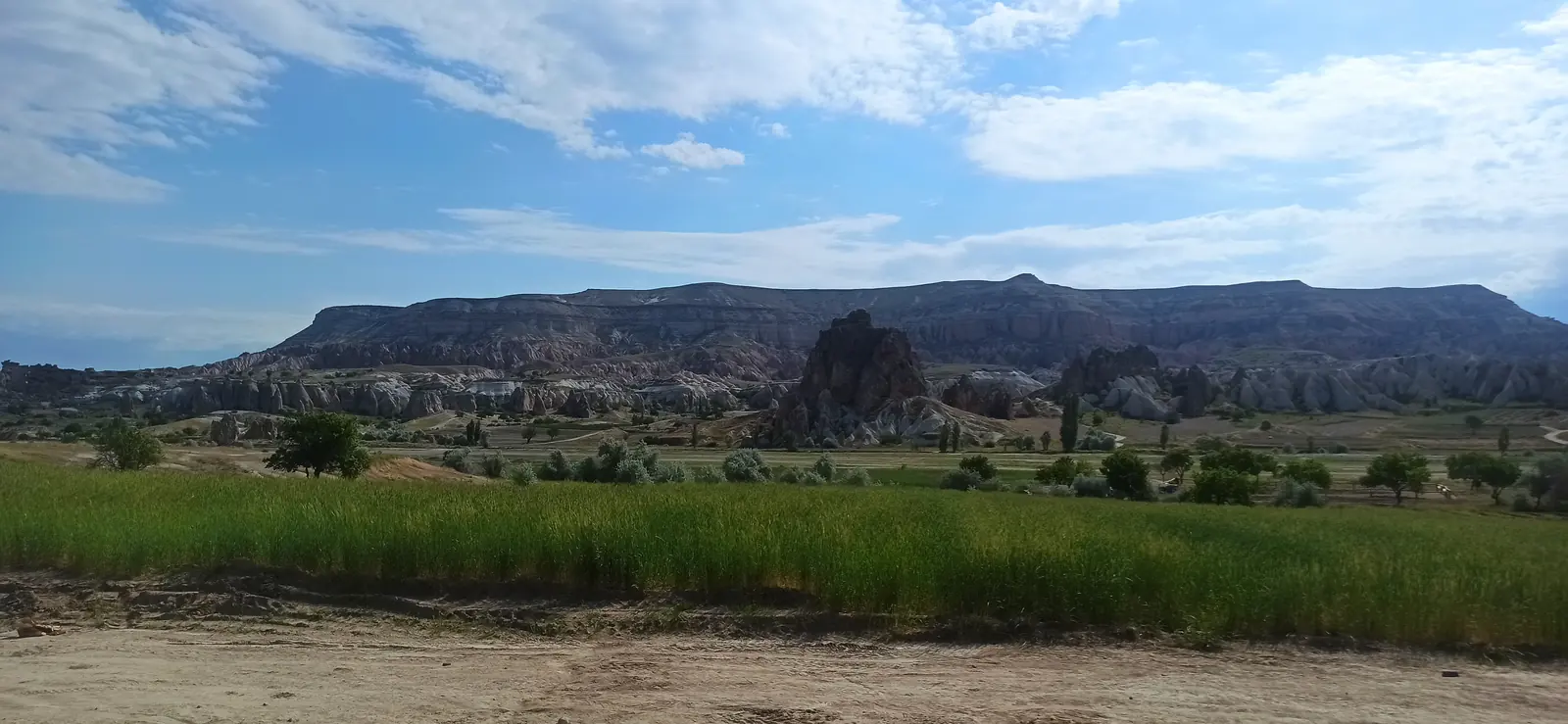 A wide plain with a flat-topped ridge on the horizon